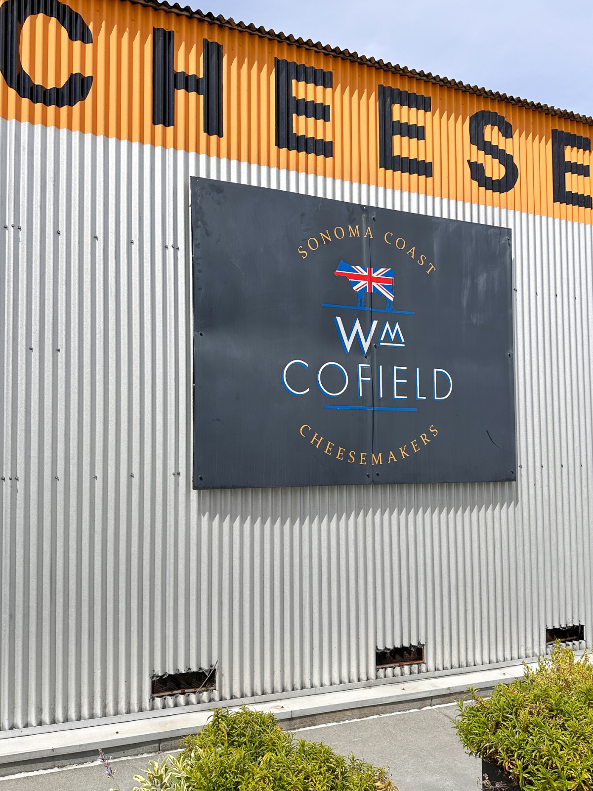 Sign for Wm Cofield Cheese shop at The Barlow.
