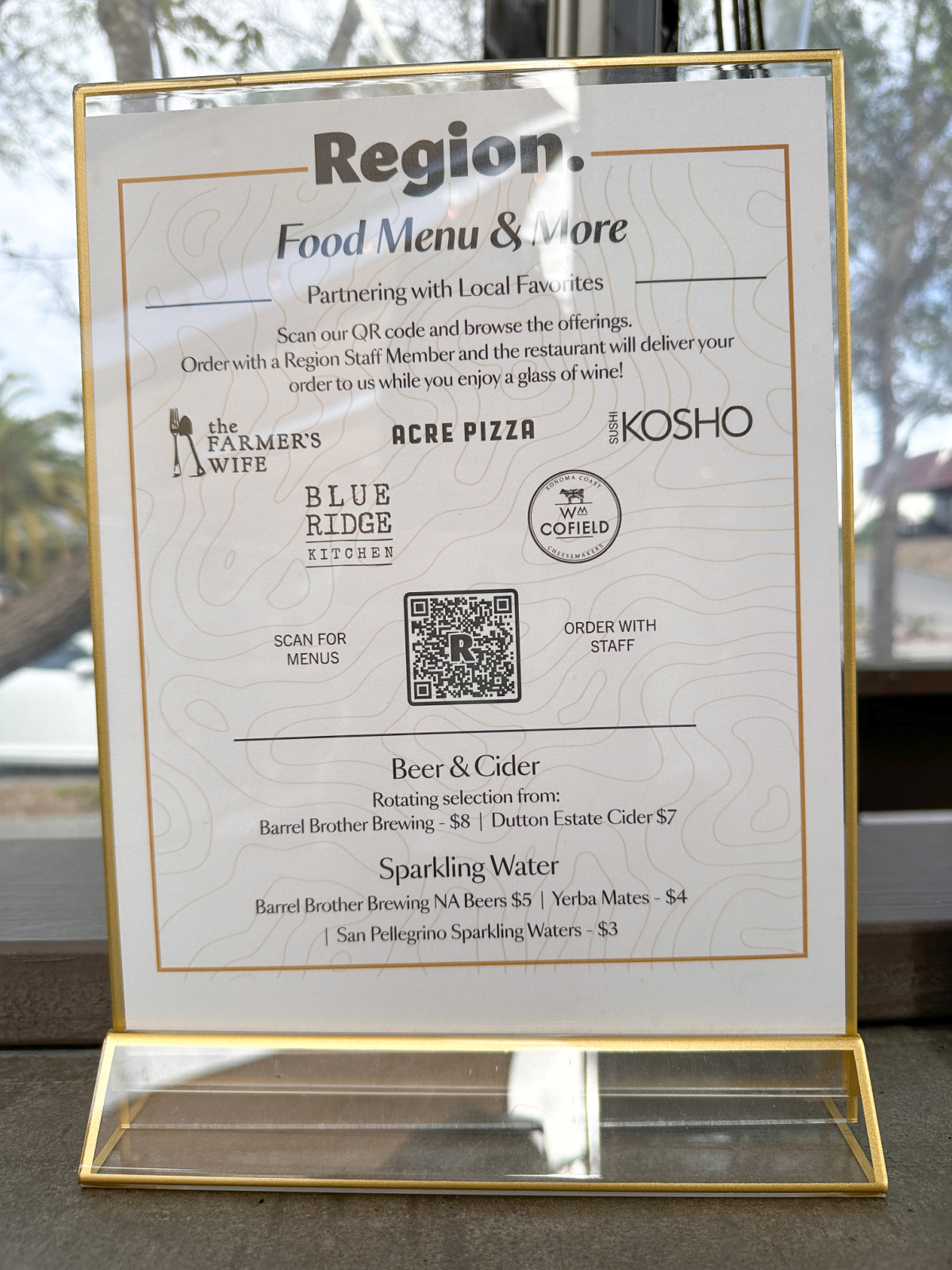 Sign with QR code to have food delivered at The Barlow.